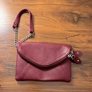 Maroon wristlet.